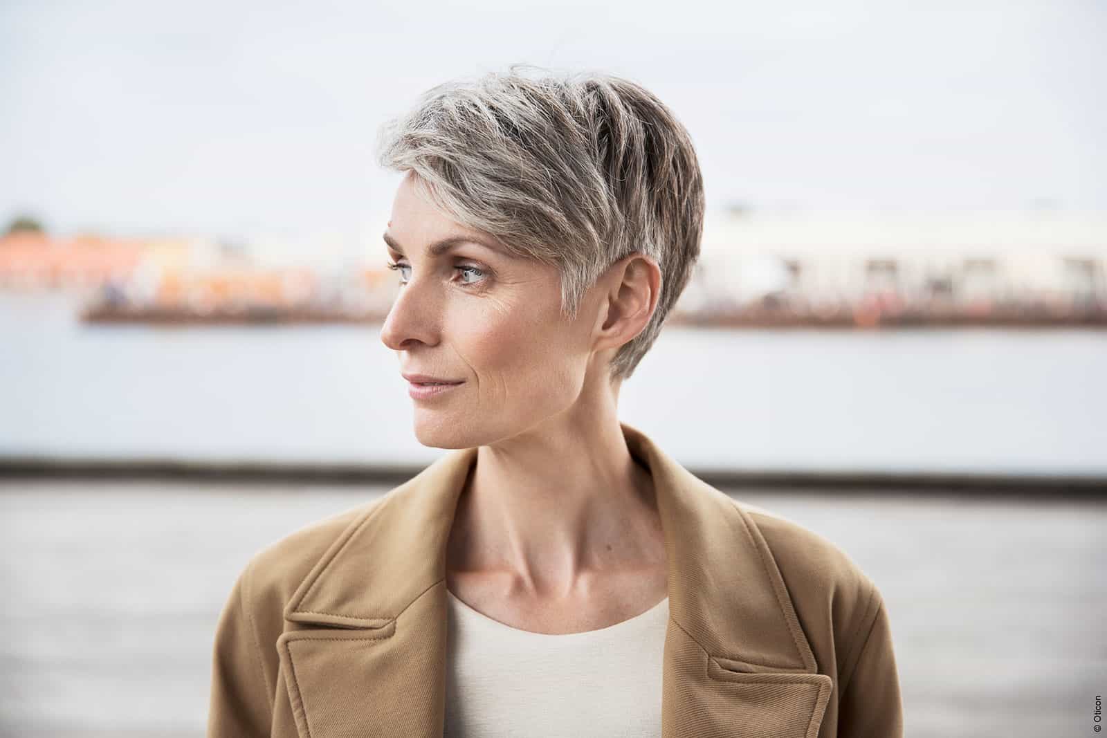 lady wearing invisible hearing aids