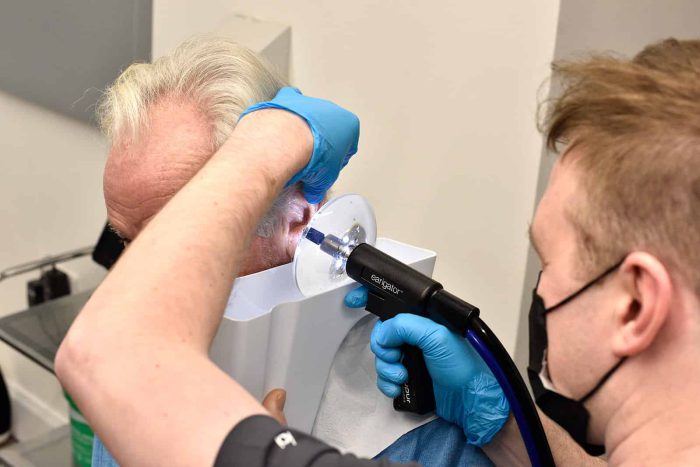 Professional, private ear wax removal using gentle irrigation.