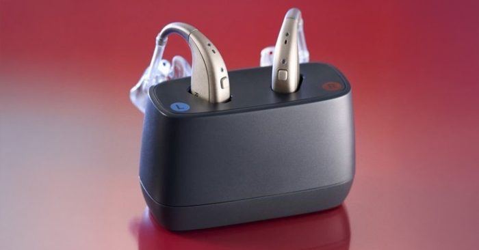 Resound Enzo IA in charger with ear moulds