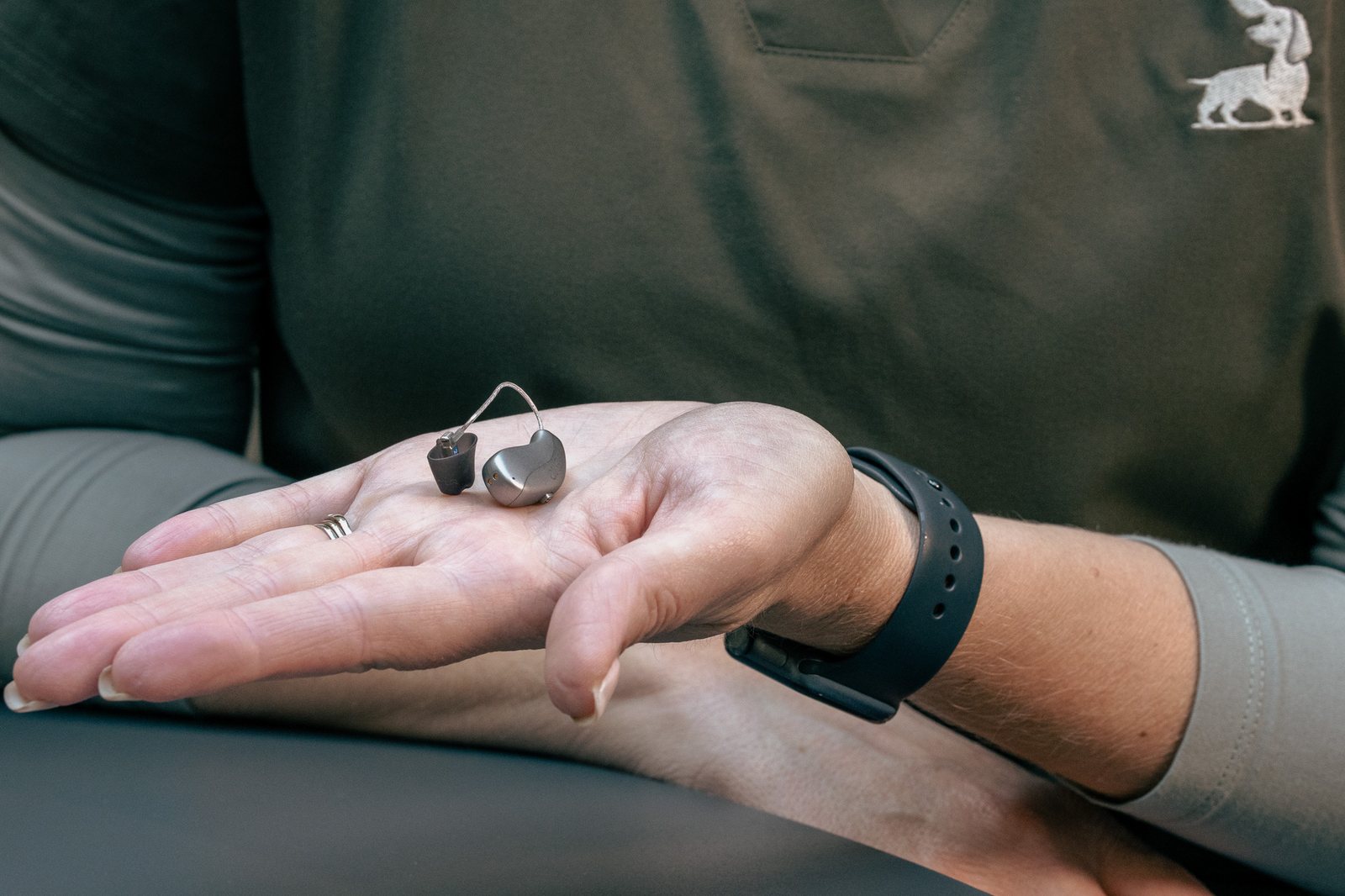 Widex receiver-in-canal hearing aid shown in an Alto Hearing clinic