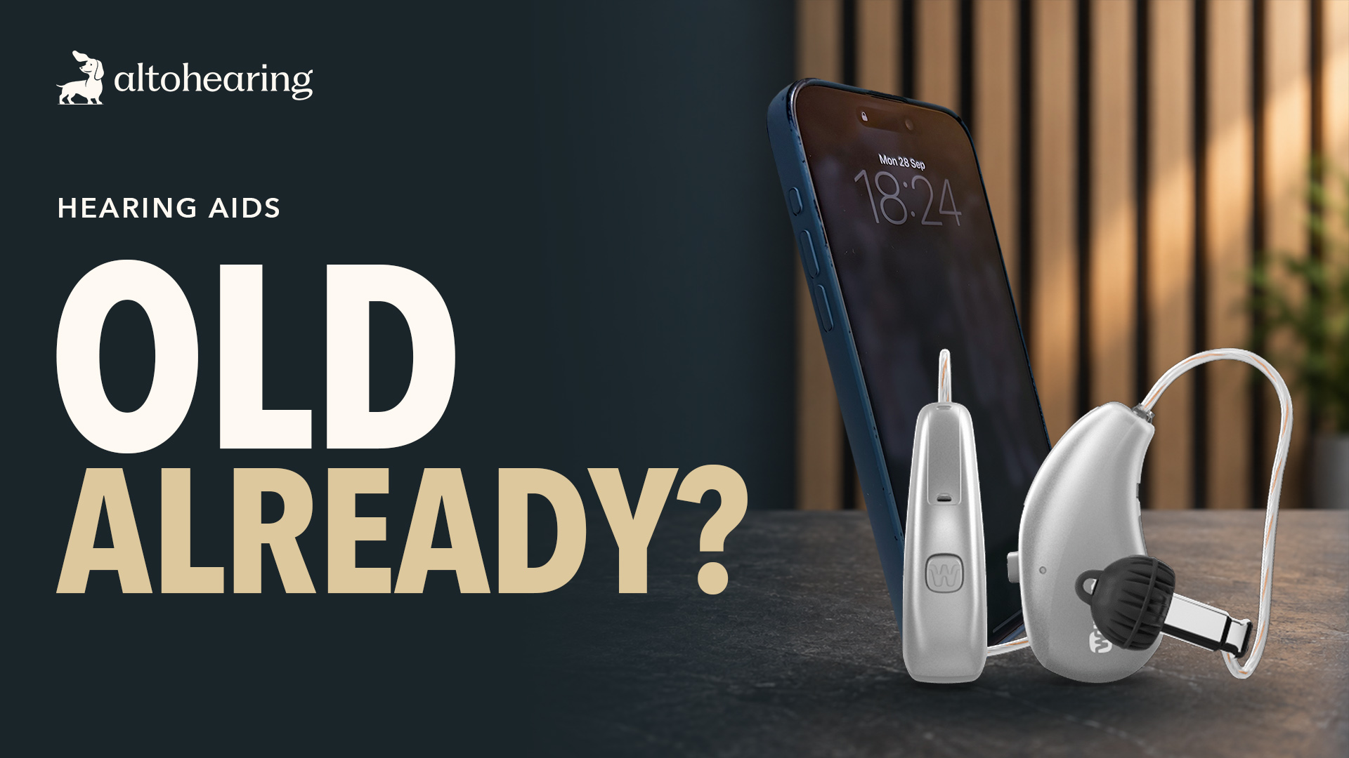 An iPhone beside a Widex hearing aid with the words “Old already?”