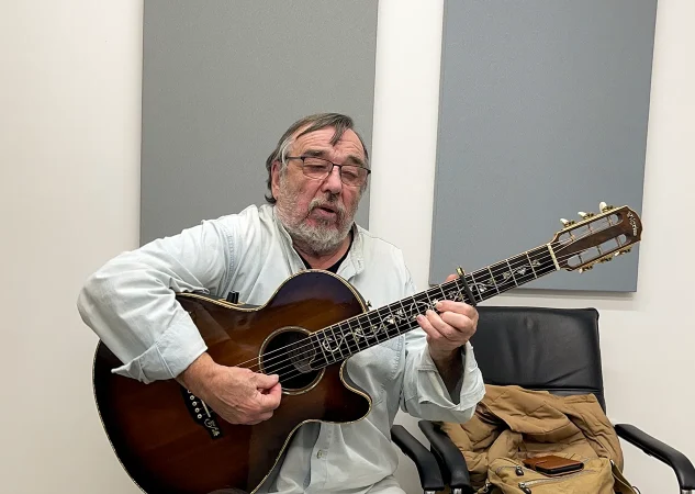 Why does music sound distorted through hearing aids?